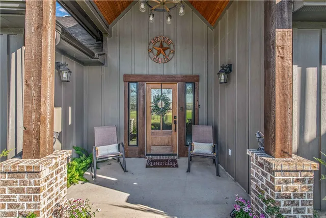 a view of an outdoor space with porch and furniture