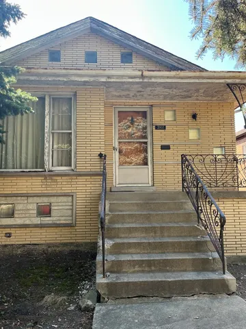 a view of a house with a large window