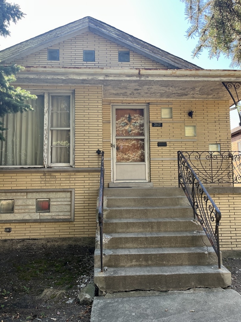 a view of a house with a large window
