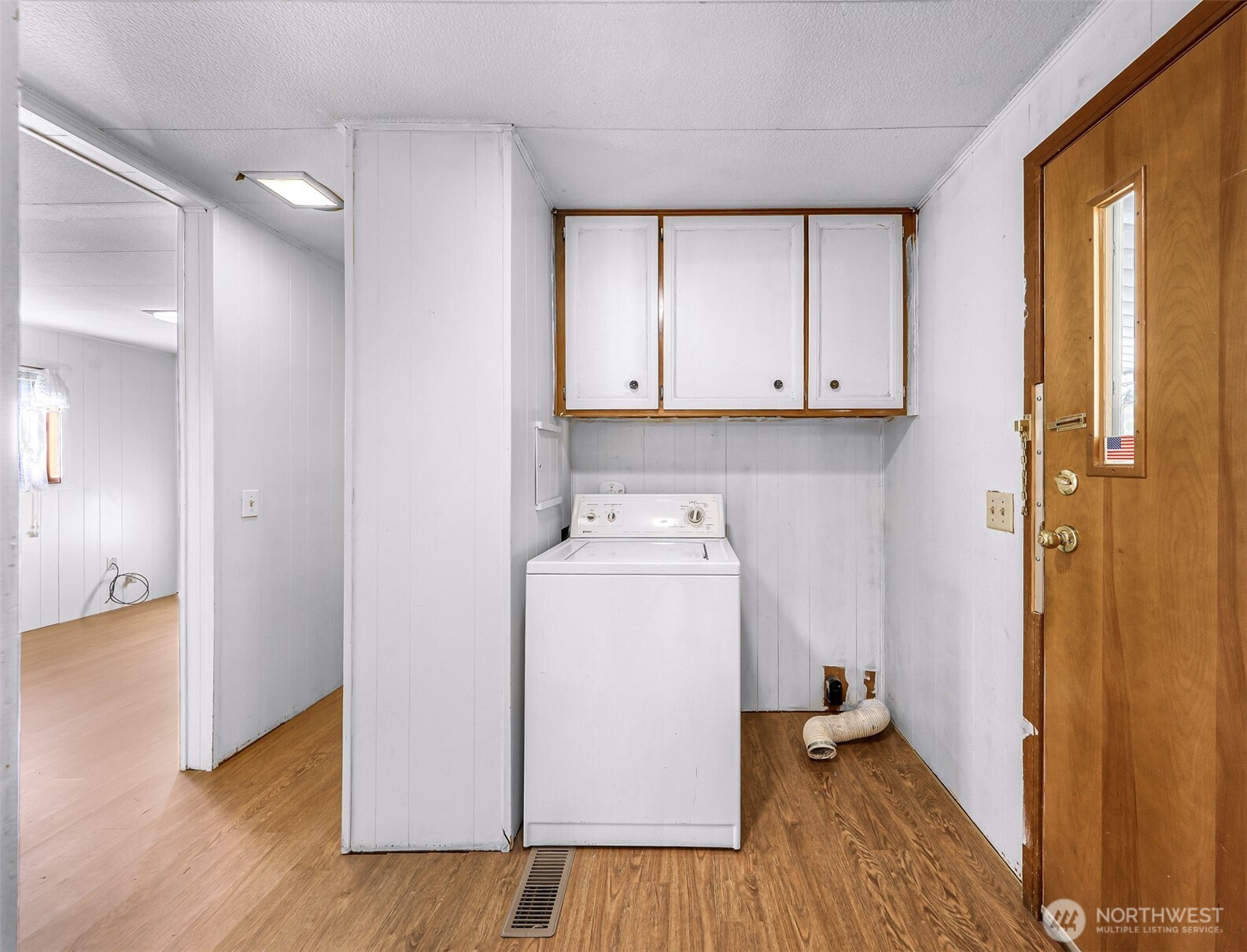 9403 Pierce Lane, Unit 1 Sedro-Woolley, WA 98284 - Photo 13 of 30 a view of a storage and utility room with wooden floor