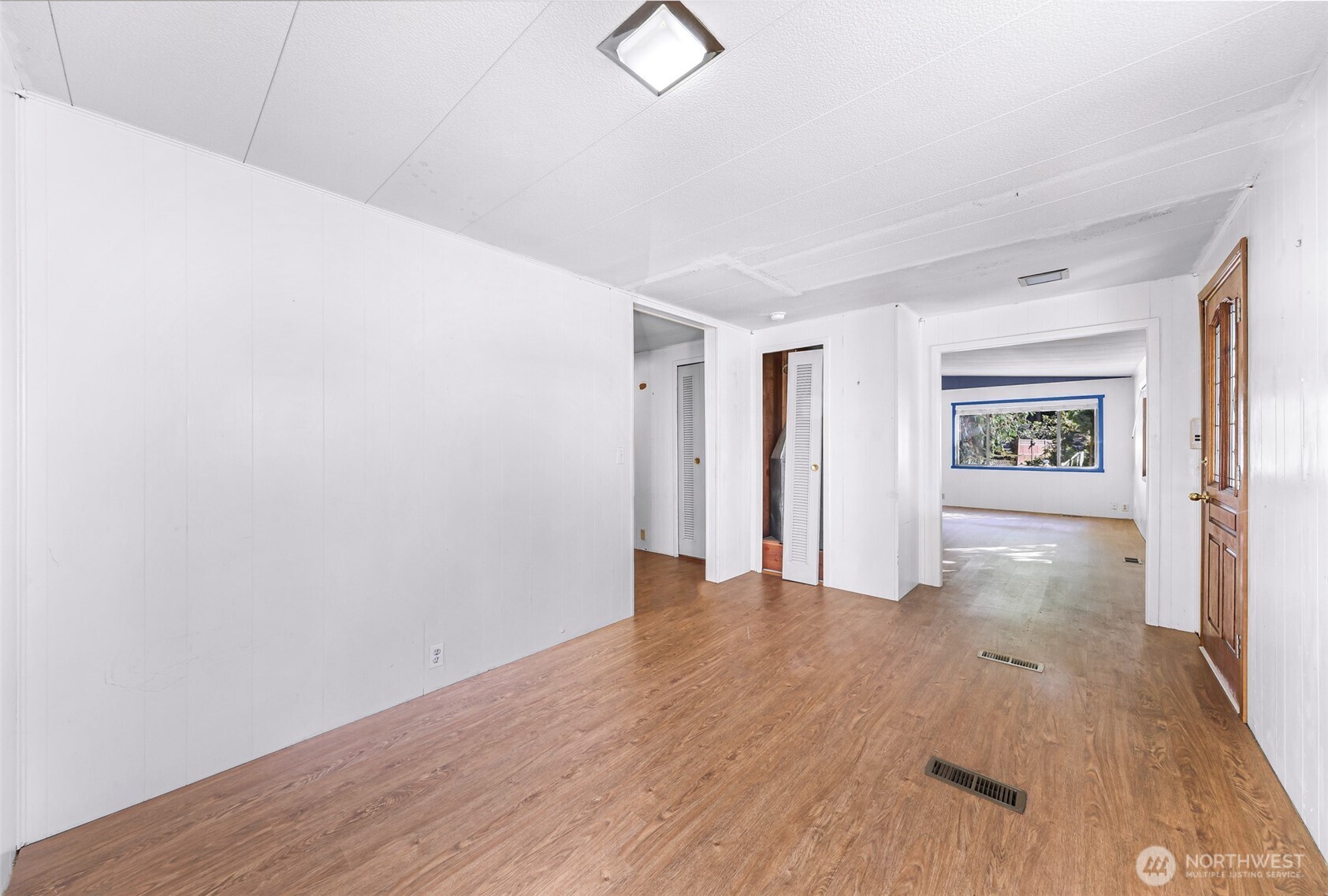 9403 Pierce Lane, Unit 1 Sedro-Woolley, WA 98284 - Photo 16 of 30 wooden floor in an empty room