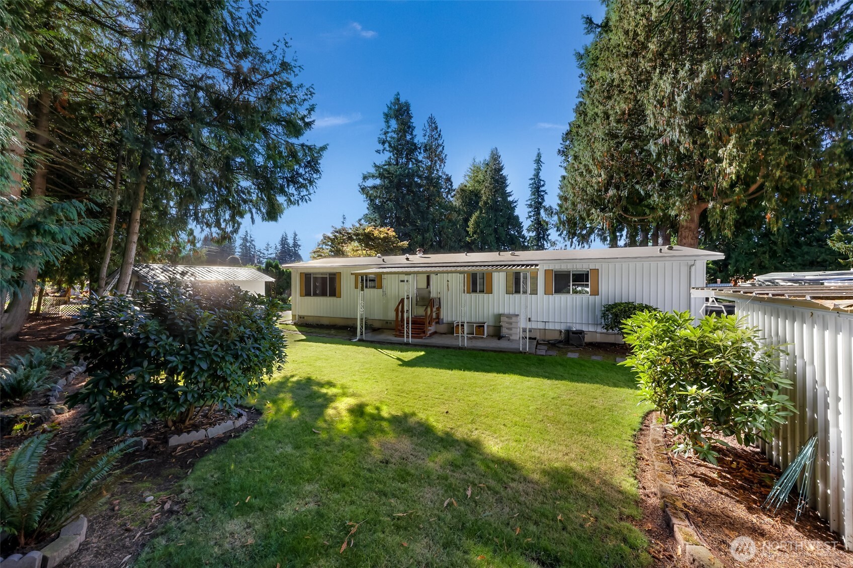 9403 Pierce Lane, Unit 1 Sedro-Woolley, WA 98284 - Photo 27 of 30 a front view of house with yard and green space