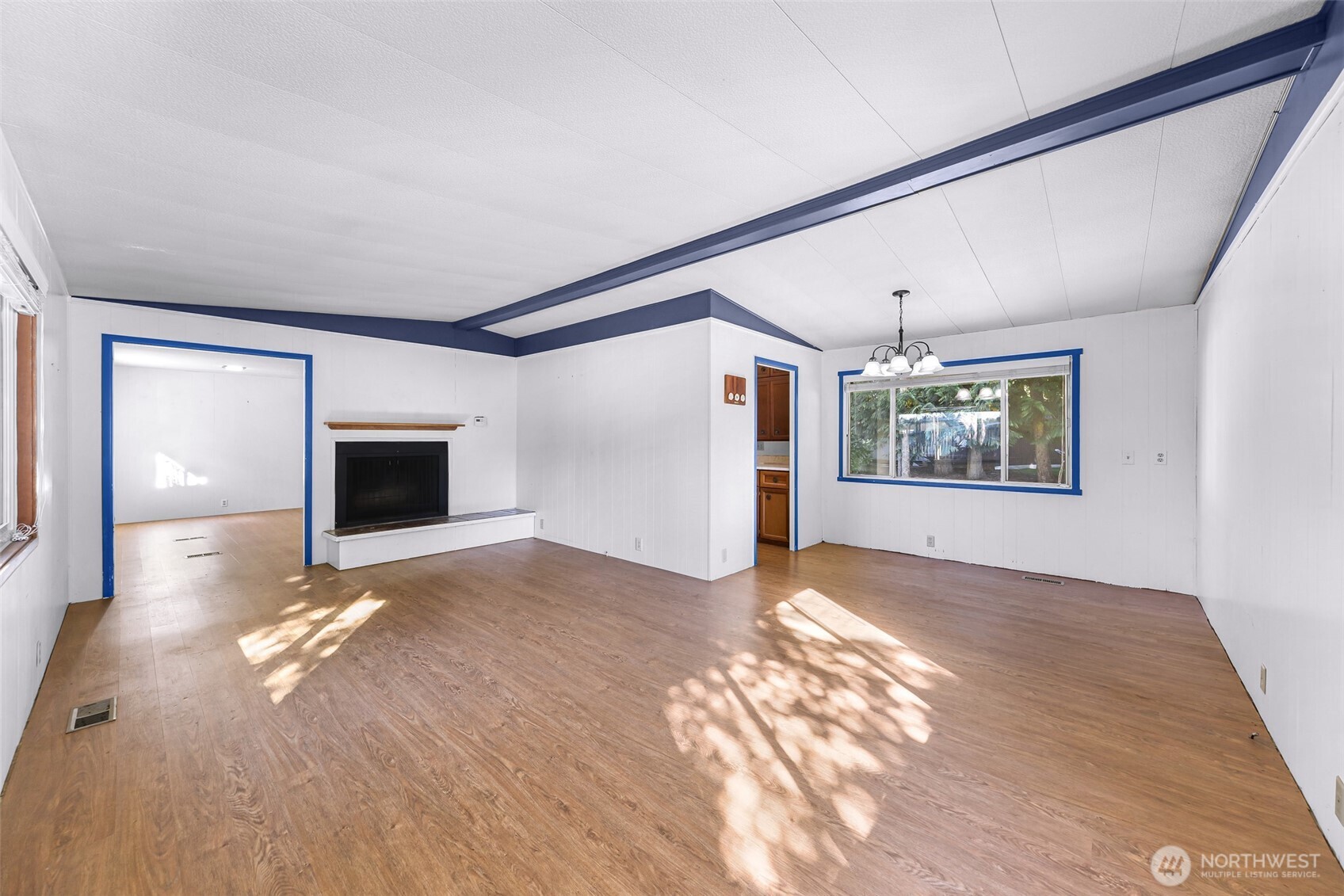 9403 Pierce Lane, Unit 1 Sedro-Woolley, WA 98284 - Photo 6 of 30 a view of a livingroom with an empty space and a fireplace