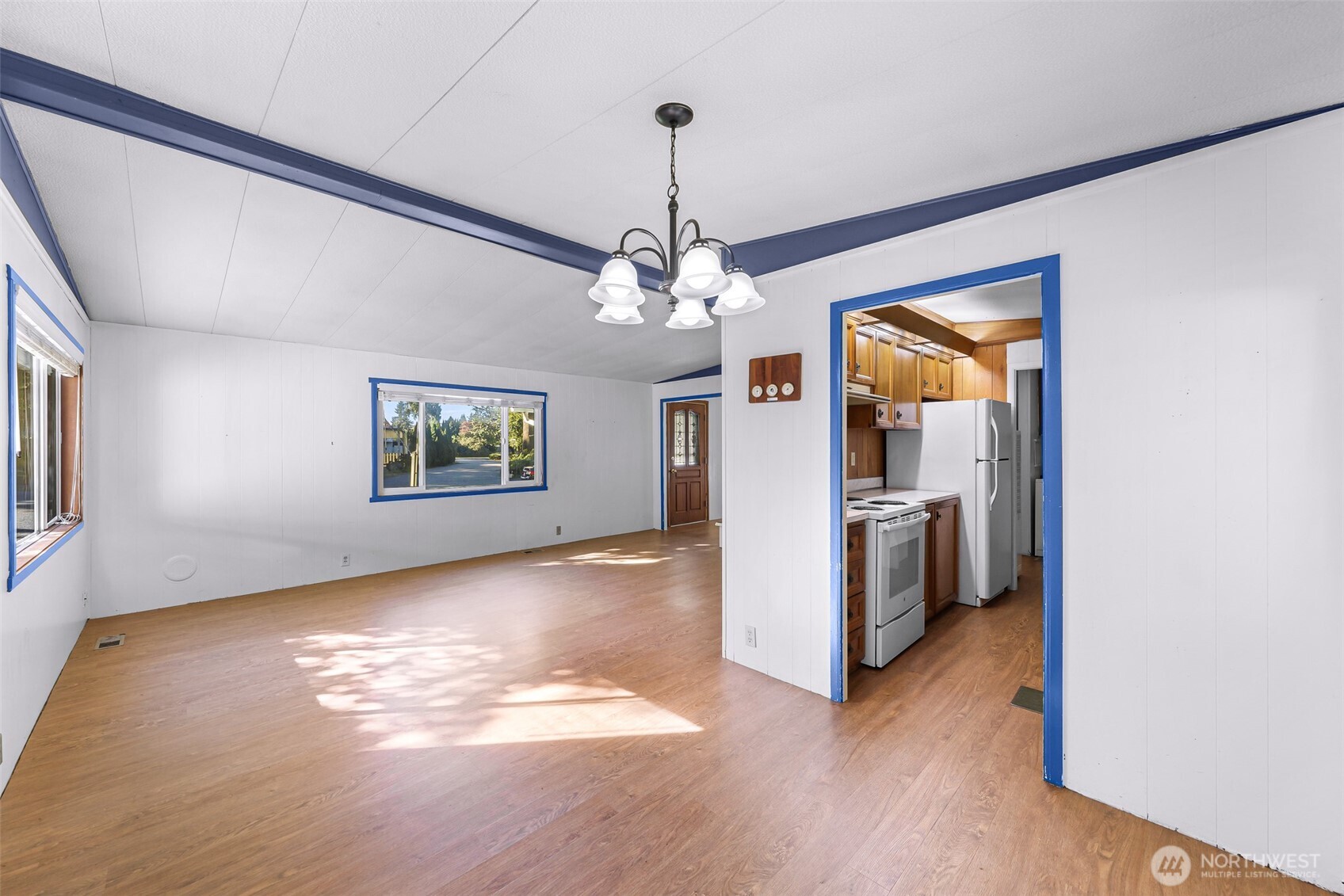 9403 Pierce Lane, Unit 1 Sedro-Woolley, WA 98284 - Photo 8 of 30 a view of a room with window and wooden floor