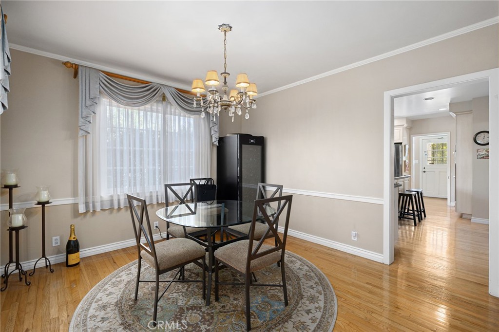 2964 Lombardy Road Pasadena, CA 91107 - Photo 16 of 69 a view of a dining room with furniture window and wooden floor