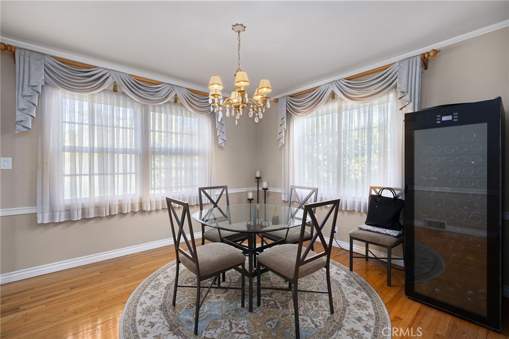 2964 Lombardy Road Pasadena, CA 91107 - Photo 17 of 69 a view of a dining room with furniture window and wooden floor