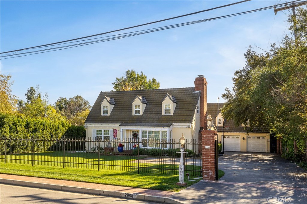 2964 Lombardy Road Pasadena, CA 91107 - Photo 2 of 69 a view of a house with a swimming pool