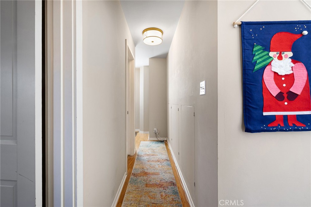 2964 Lombardy Road Pasadena, CA 91107 - Photo 32 of 69 a view of a hallway with wooden floor
