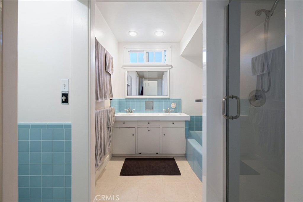 2964 Lombardy Road Pasadena, CA 91107 - Photo 35 of 69 a bathroom with a sink a toilet and shower