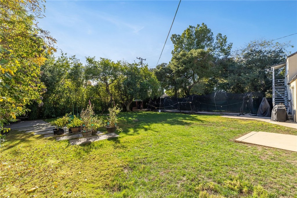 2964 Lombardy Road Pasadena, CA 91107 - Photo 47 of 69 a view of a swimming pool with an outdoor space and seating area
