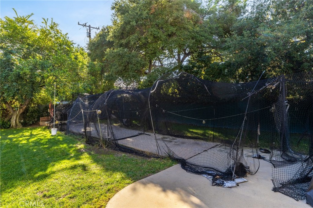 2964 Lombardy Road Pasadena, CA 91107 - Photo 48 of 69 a view of a chair and table in backyard