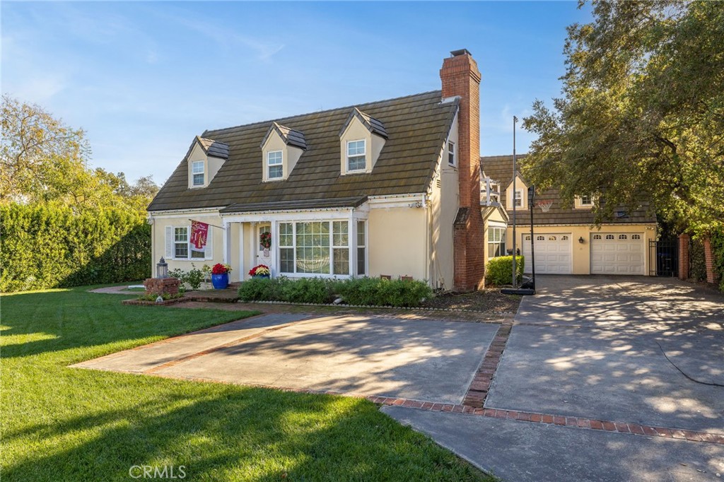 2964 Lombardy Road Pasadena, CA 91107 - Photo 5 of 69 a front view of a house with a yard and garage