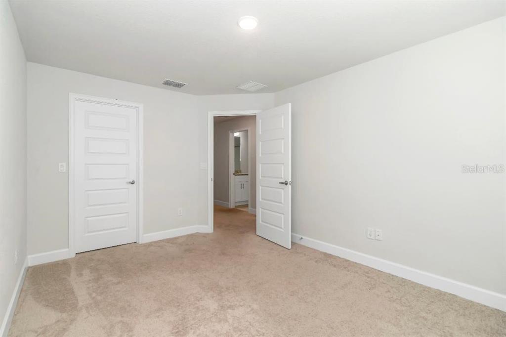 8376 Southwest 59th Terrace Ocala, FL 34476 - Photo 15 of 23 an empty room with closet area