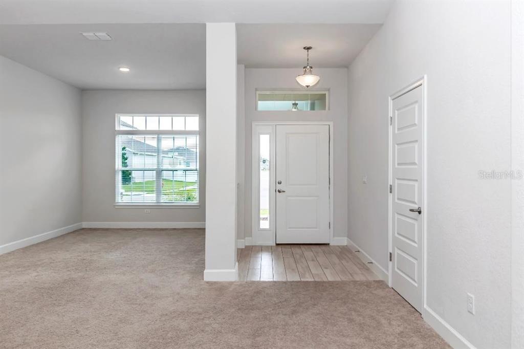 8376 Southwest 59th Terrace Ocala, FL 34476 - Photo 19 of 23 an empty room with windows and closet