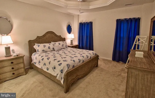 a living room with furniture or couch and a large window