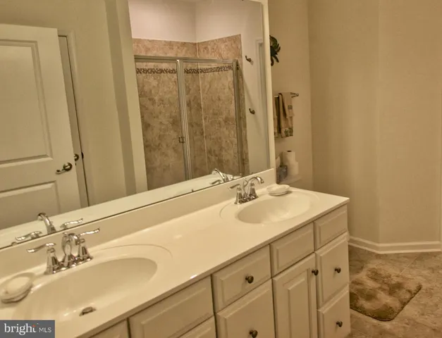 a view of a swimming pool and lounge chair