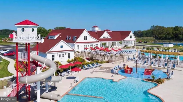a bathroom with a toilet sink and shower