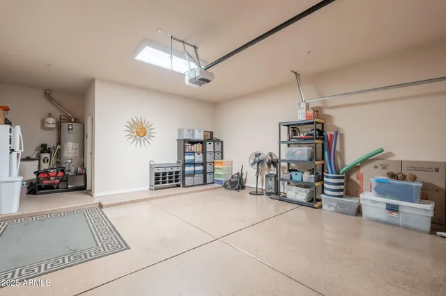 an aerial view of residential building and lake