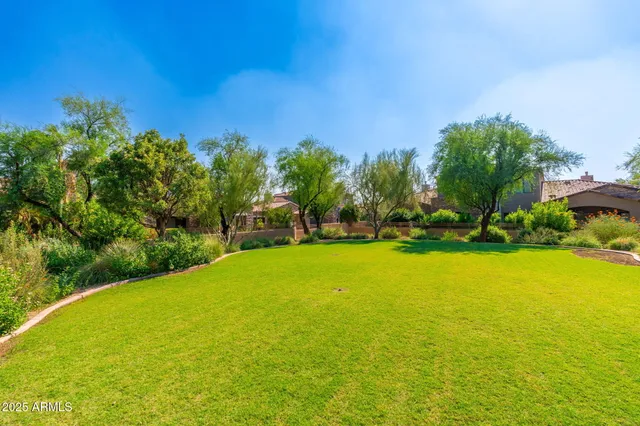 a view of a street with houses on both side