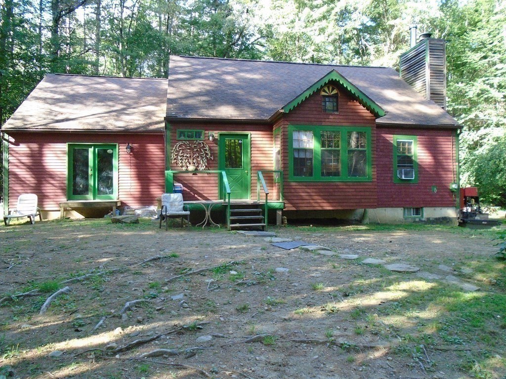 30 Clark Road Sandisfield, MA 01255 - Photo 1 of 41 a front view of a house with garden