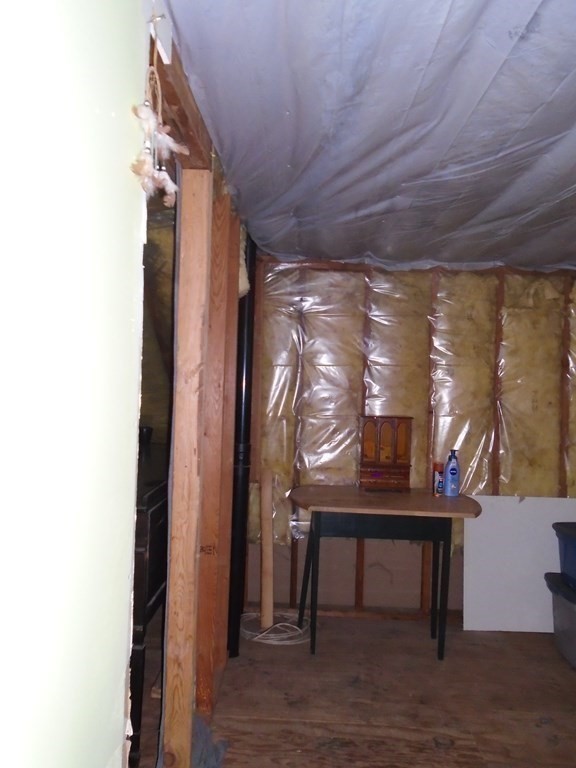 30 Clark Road Sandisfield, MA 01255 - Photo 31 of 41 a room with wooden floor and furniture