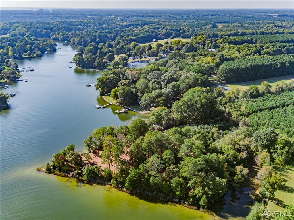 1852 Ocran Road White Stone, VA 22578 - Photo 17 of 50 Aerial view of a heavily wooded area and a nearby
