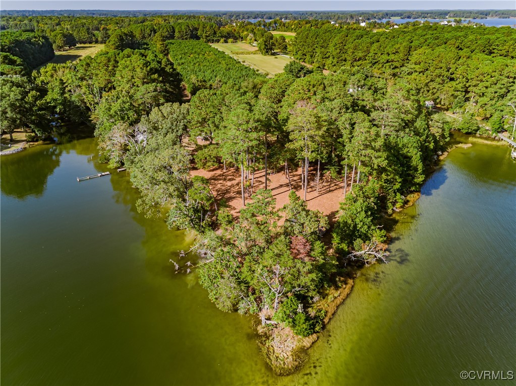 1852 Ocran Road White Stone, VA 22578 - Photo 26 of 50 Aerial view of a heavily wooded area and a nearby