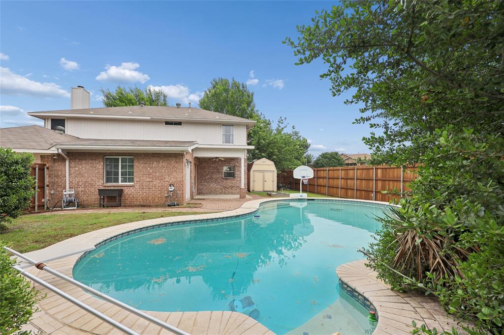 828 Rockefeller Lane Allen, TX 75002 - Photo 27 of 31 a front view of a house with a yard