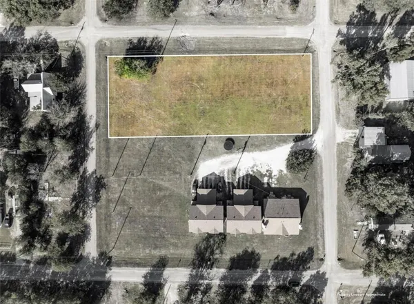 an aerial view of a pool