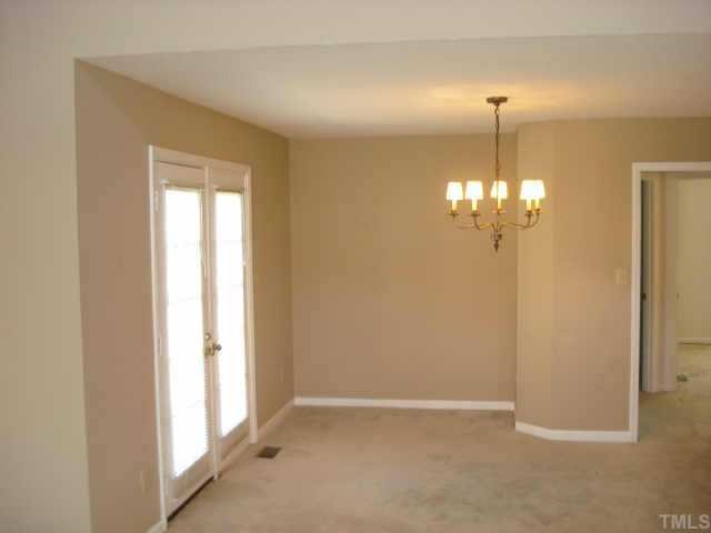4500 Emmit Drive Raleigh, NC 27604 - Photo 3 of 10 a view of a chandelier in big room and chandelier