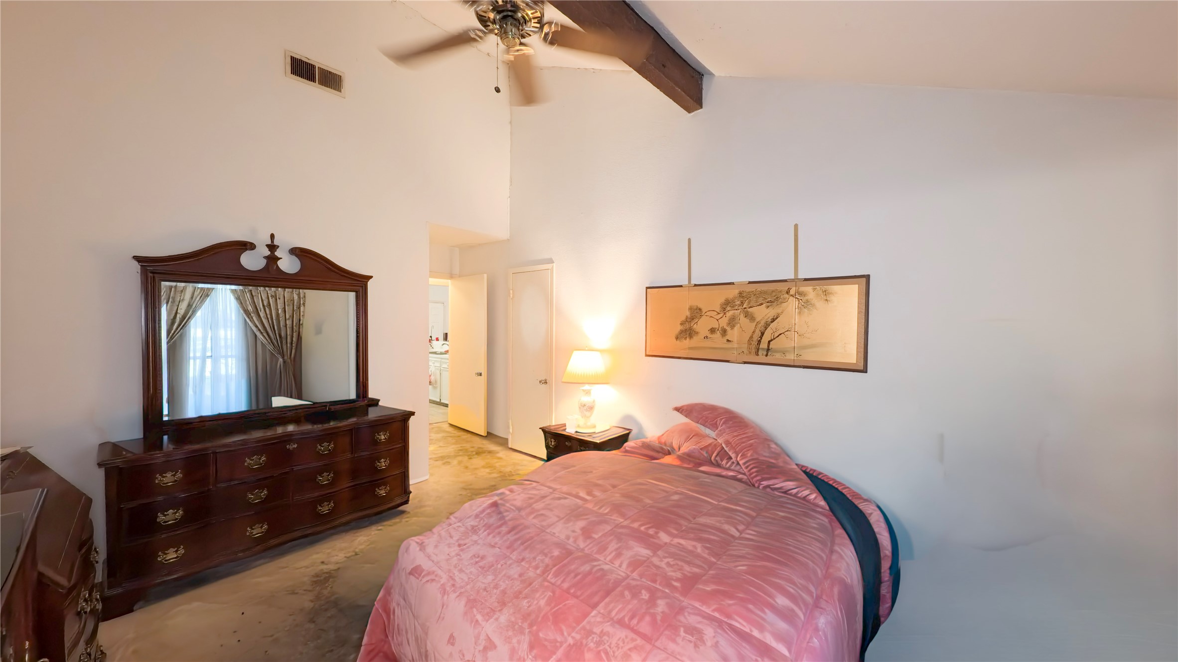 8650 Maplecrest Drive Houston, TX 77099 - Photo 6 of 15 a bedroom with a bed and a flat tv screen on a dresser