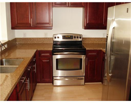 604 Northwest 38th Circle, Unit 604 Boca Raton, FL 33431 - Photo 3 of 12 Kitchen