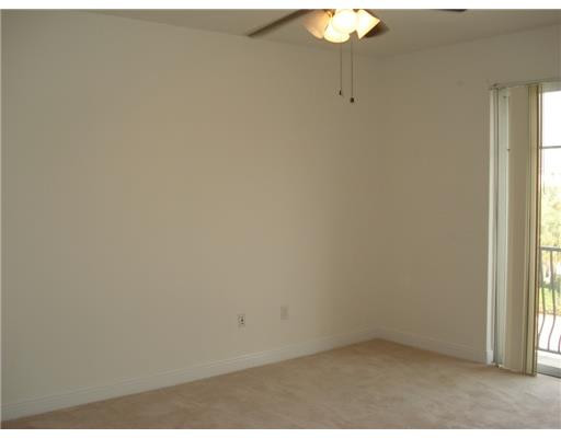 604 Northwest 38th Circle, Unit 604 Boca Raton, FL 33431 - Photo 8 of 12 Master Bedroom