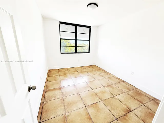 a view of a bathroom with a window