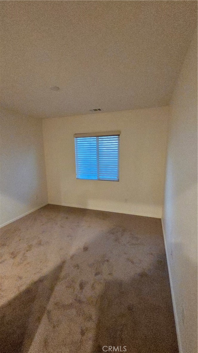 5321 Declan Street Riverside, CA 92504 - Photo 20 of 34 a view of an empty room and window
