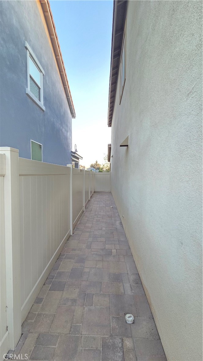 5321 Declan Street Riverside, CA 92504 - Photo 34 of 34 a view of a pathway along a building
