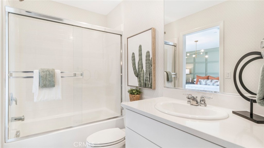19152 Chestnut Grv Court Riverside, CA 92507 - Photo 11 of 14 a bathroom with a sink a toilet and a bathtub