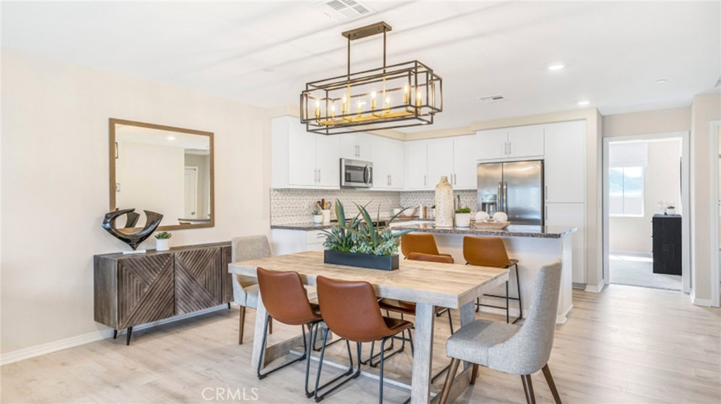 19152 Chestnut Grv Court Riverside, CA 92507 - Photo 2 of 14 a view of a dining room with furniture