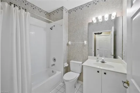 $379,000 | 1340 Charleston Square Drive, Unit 101, Naples, FL 34110