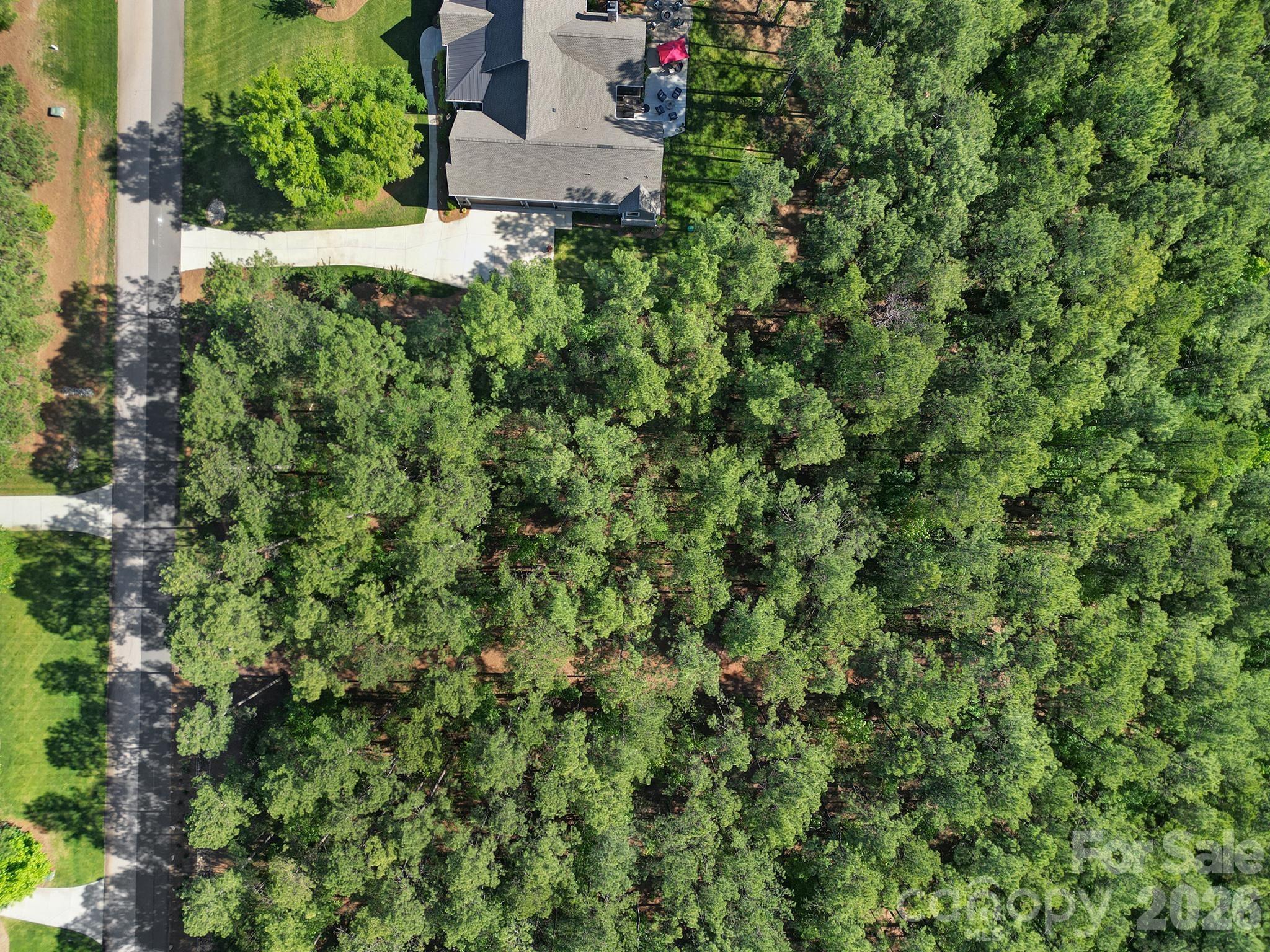 4079 Persimmon Road Lancaster, SC 29720 - Photo 8 of 14 an aerial view of residential house with outdoor space and trees all around