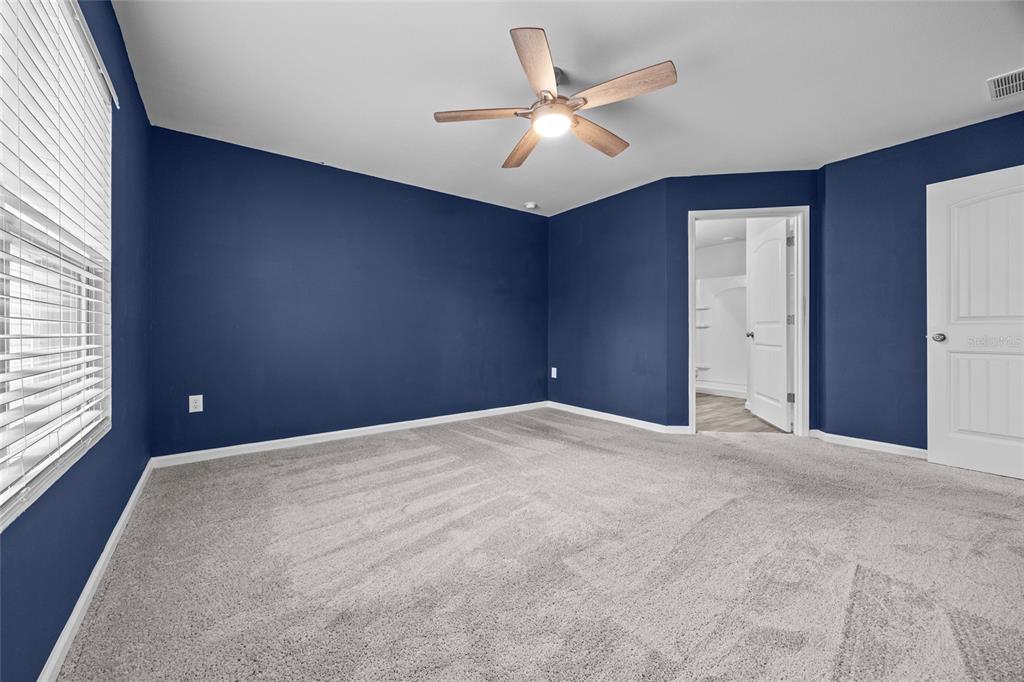20105 Northwest 247th Street High Springs, FL 32643 - Photo 11 of 26 a view of an empty room with a window