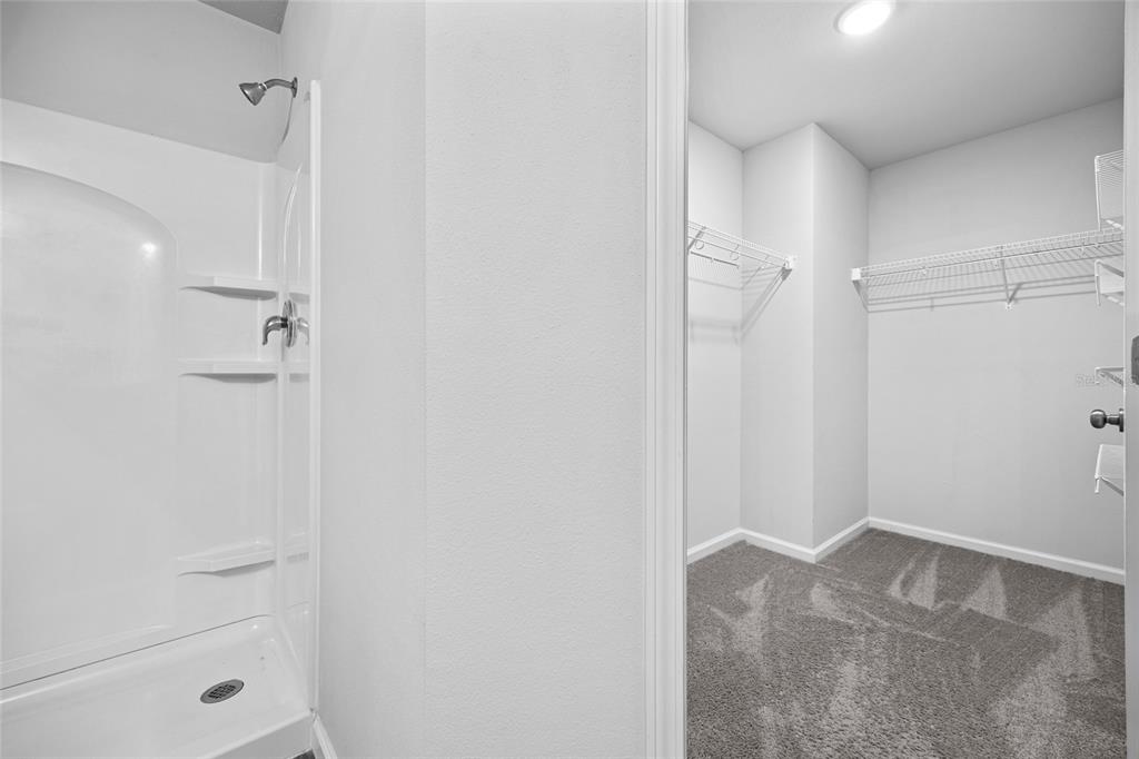 20105 Northwest 247th Street High Springs, FL 32643 - Photo 14 of 26 a bathroom with a shower and a shower