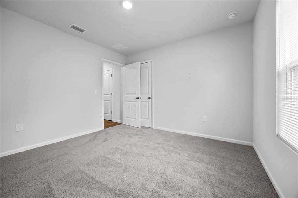 20105 Northwest 247th Street High Springs, FL 32643 - Photo 15 of 26 an empty room with windows