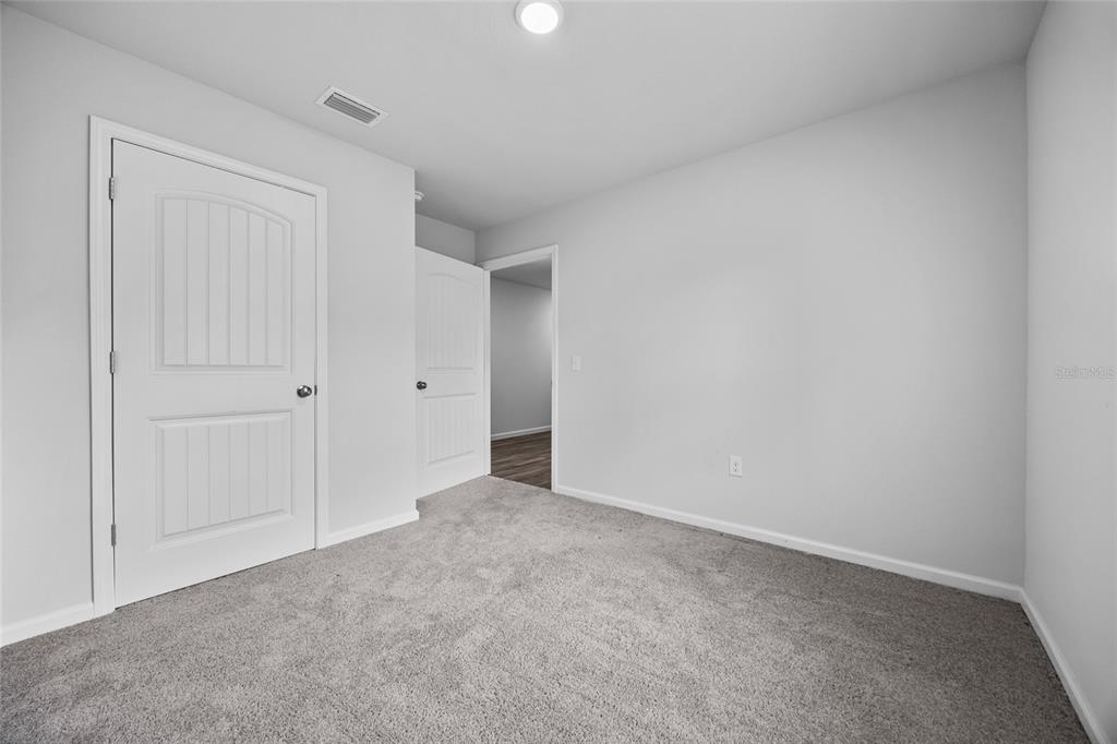 20105 Northwest 247th Street High Springs, FL 32643 - Photo 19 of 26 a view of an empty room