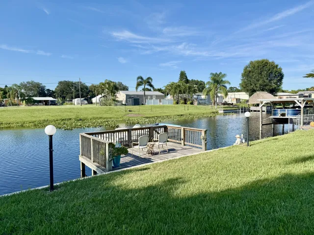 a view of a garden with an ocean view