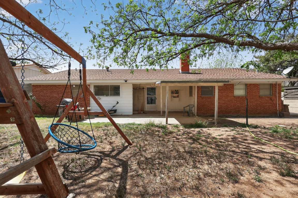 2709 Rebecca Drive Big Spring, TX 79720 - Photo 14 of 50 a front view of a house with garden