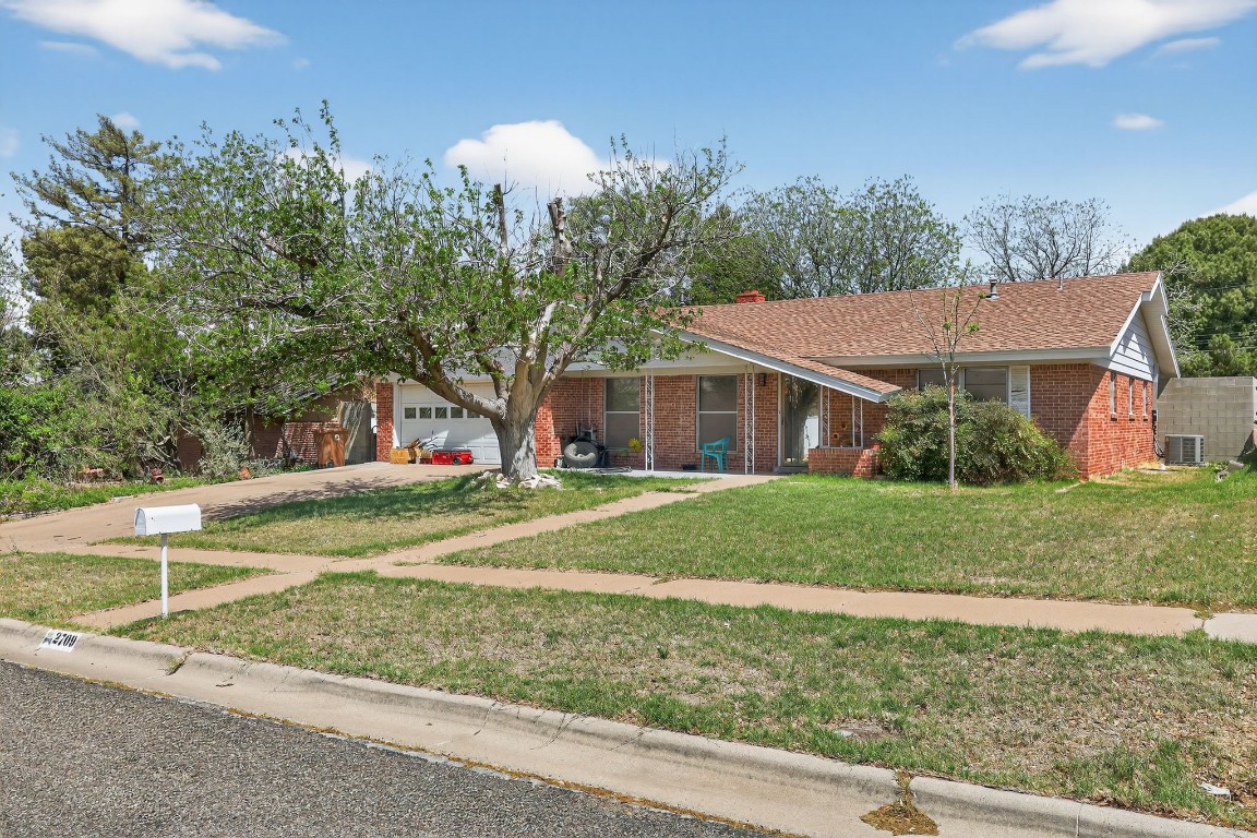 2709 Rebecca Drive Big Spring, TX 79720 - Photo 15 of 50 a view of a house with a yard and tree s