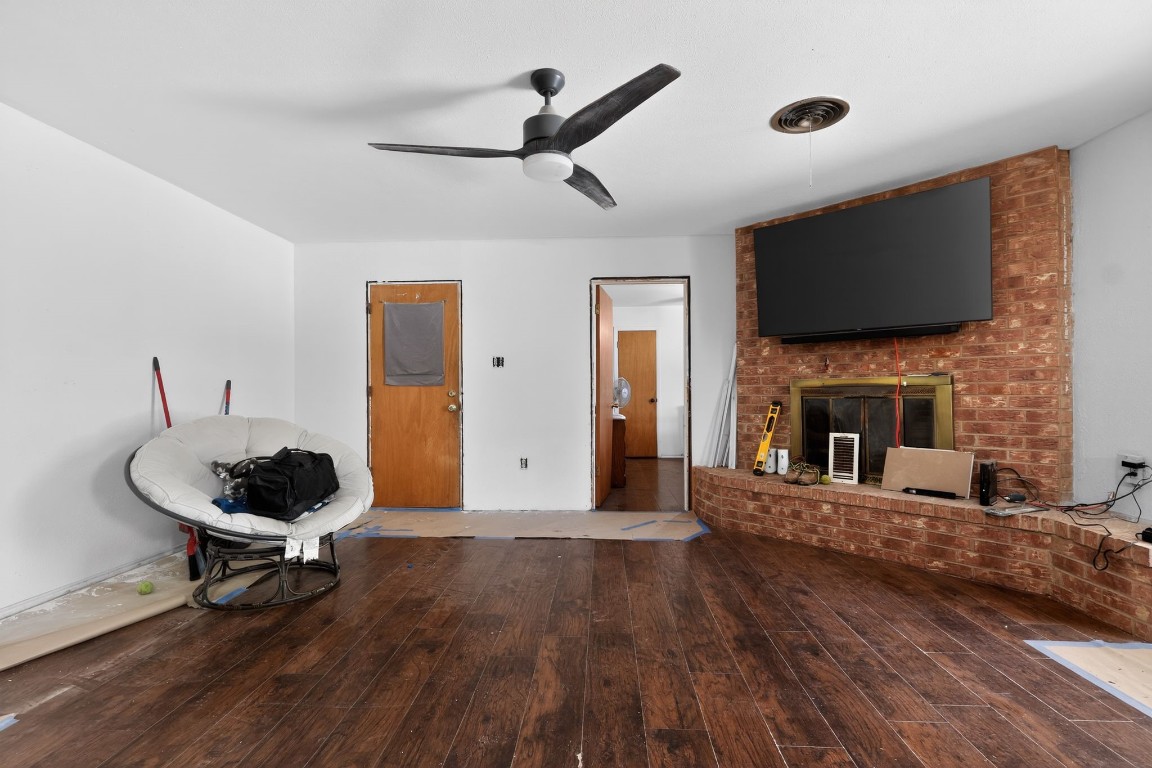 2709 Rebecca Drive Big Spring, TX 79720 - Photo 24 of 50 a living room with furniture and a fireplace