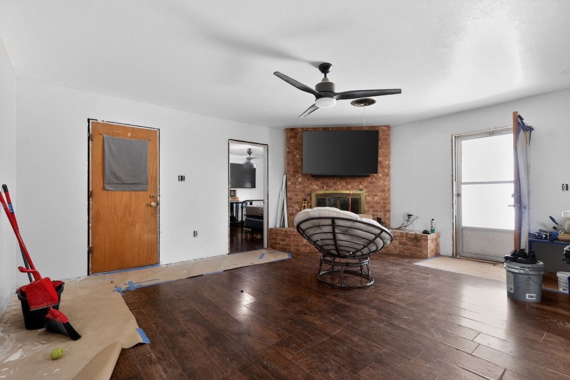2709 Rebecca Drive Big Spring, TX 79720 - Photo 25 of 50 a living room with furniture and a fireplace
