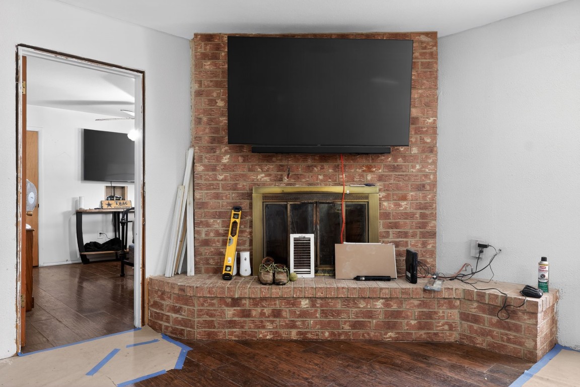 2709 Rebecca Drive Big Spring, TX 79720 - Photo 27 of 50 a living room with fireplace furniture and a flat screen tv
